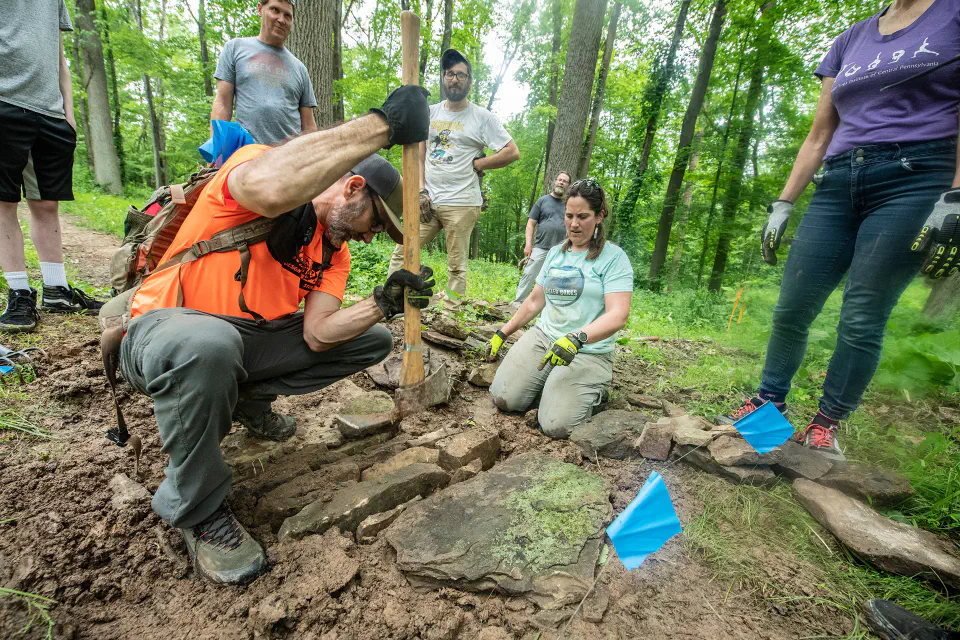 A group of people trail building