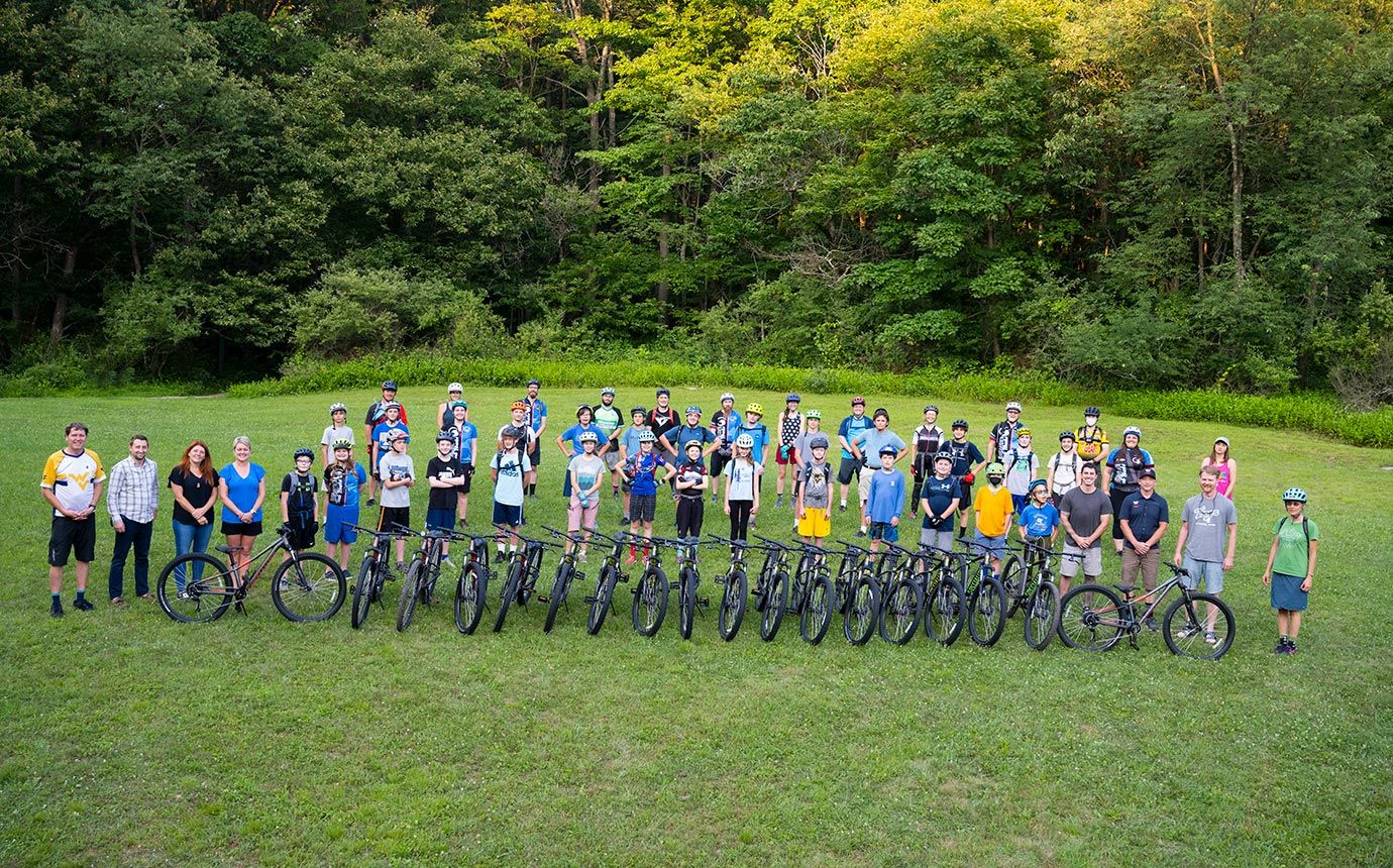 YCC and Smith OEDC group poses with new bikes.
