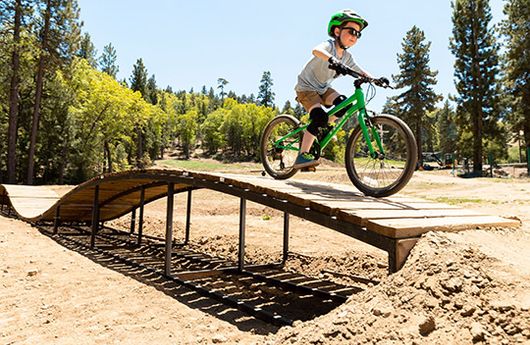 A kid rides a ramp at Big Bear State Park
