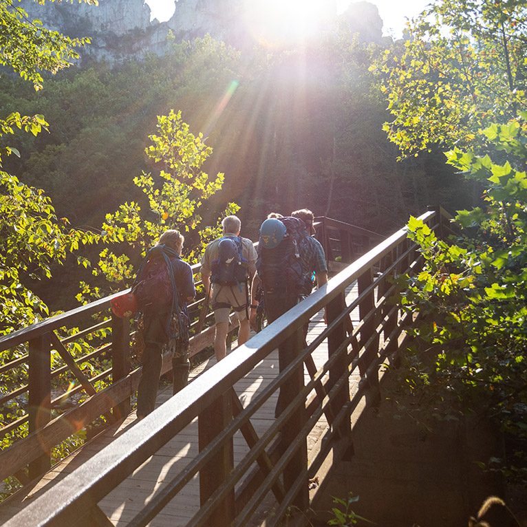 Brad, Alys, Greg and Danny walk towards Seneca Rocks